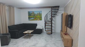 Living area - A warm and comfortable home (Mărgineni)