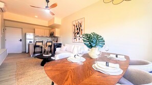 A modern kitchen with a dining area. - Couples Private Plunge Pool Retreat Near Beach (Punta Cana)