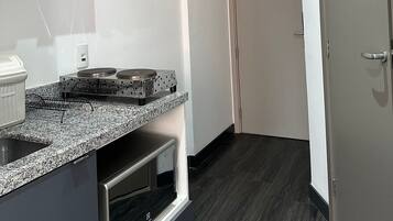 Fridge, microwave, stovetop, cookware/dishes/utensils