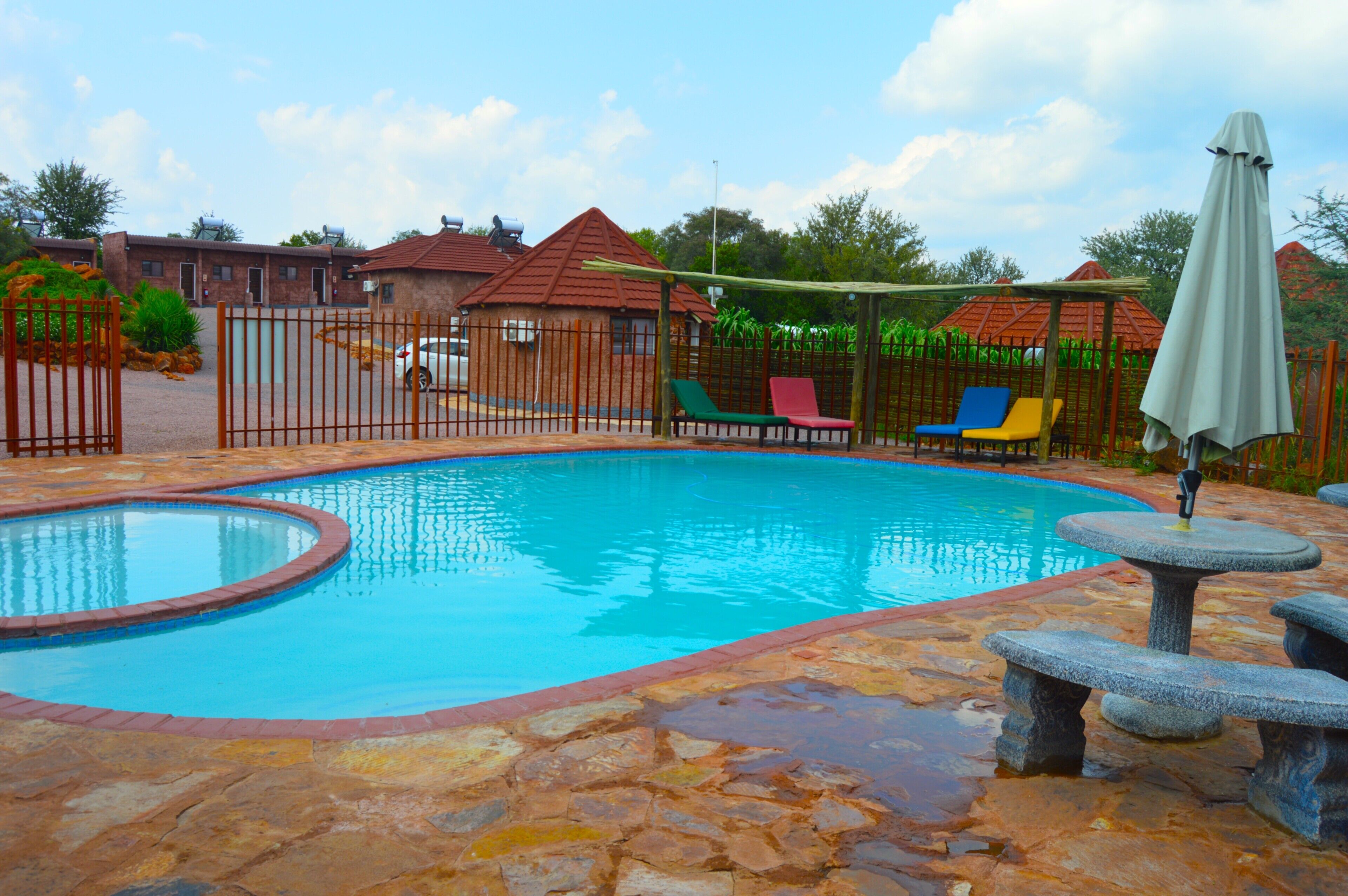 Outdoor pool, open 8:00 AM to 7:00 PM, pool umbrellas, sun loungers