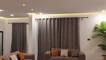 Deluxe Apartment, Balcony, City View | Living area