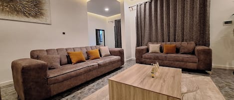 Deluxe Apartment, Balcony, City View | Living area
