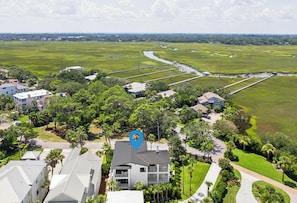 A residential area with houses, a river, and a bridge. - Villa Del Mar - East Beach (St Simons Island)