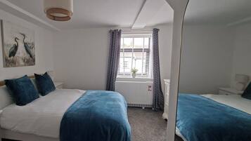 Desk, iron/ironing board, WiFi (free), bed sheets