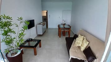 Deluxe Apartment, Balcony, Beach View | Living area