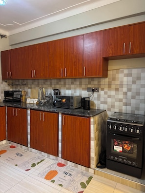 Unclassified image, 5 of 6, button - Naperville Apartments Premium (Kampala)