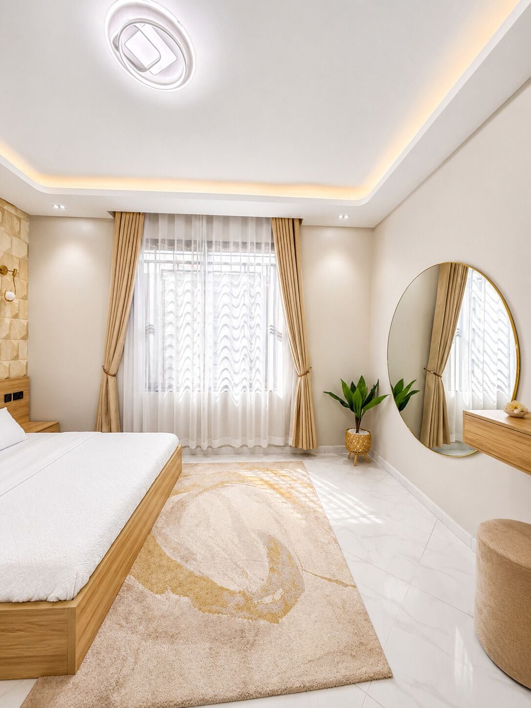 A modern bedroom with a bed, a large mirror, a potted plant, and a decorative rug.