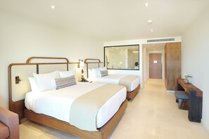 A hotel room with two beds, a desk, and a mirror. - Blissful Getaway! Sunset View, Swimming Pools, Pet-friendly, Beachfront! (Cabo San Lucas)