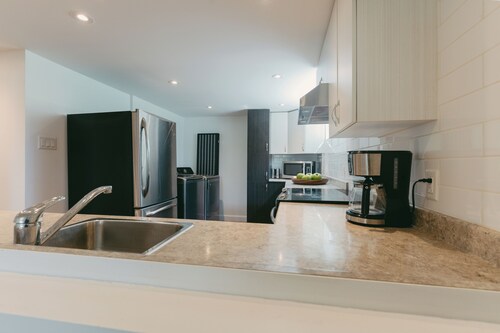 A quiet, fully equipped apartment located a 10-minute walk from Mascouche Nature Park