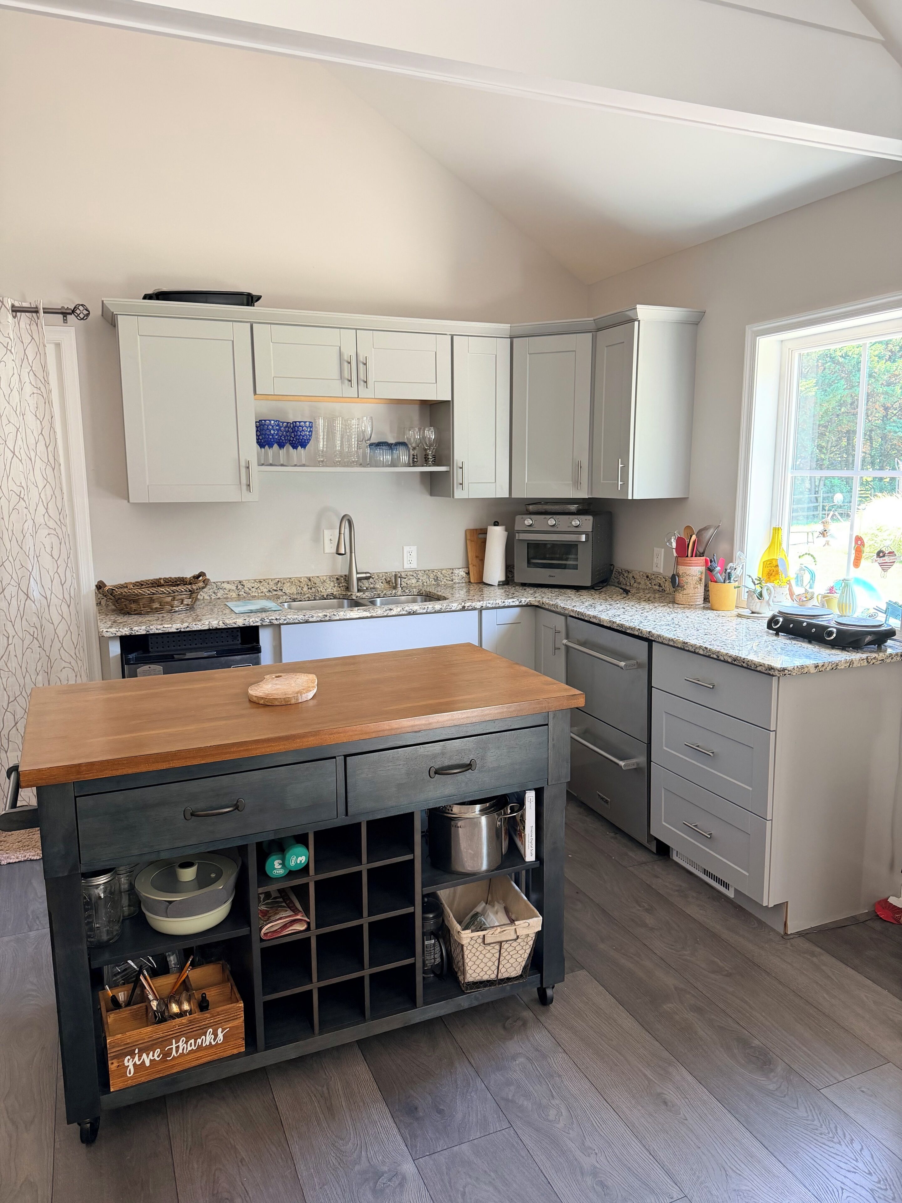 Coffee/tea maker, fridge, microwave, cookware/dishes/utensils