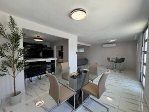 Dining - Casa Neeyam: Luxury & space, 7 min from airport. 3BR/2BA, AC, Wi-Fi, parking (Carolina)