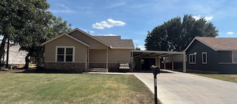 Welcome to a charming 2-bedroom home with convenient covered parking in Seymour.