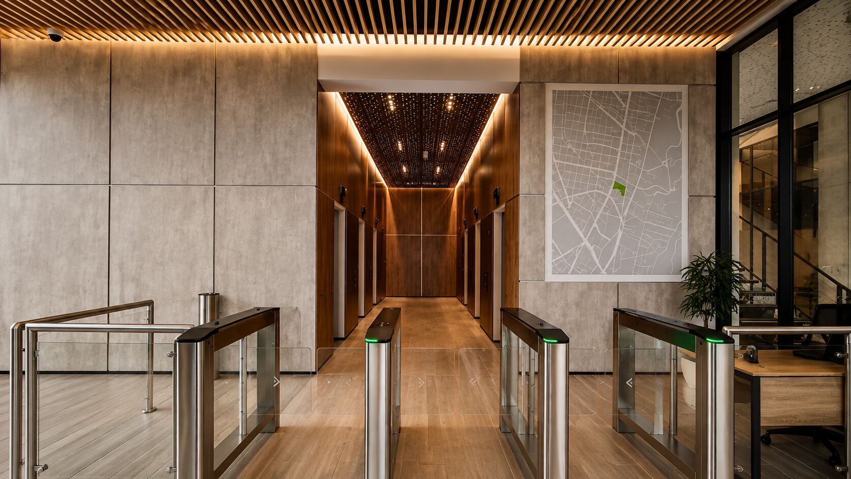 A modern hallway with a wooden ceiling, a map on the wall, and a staircase to the right.