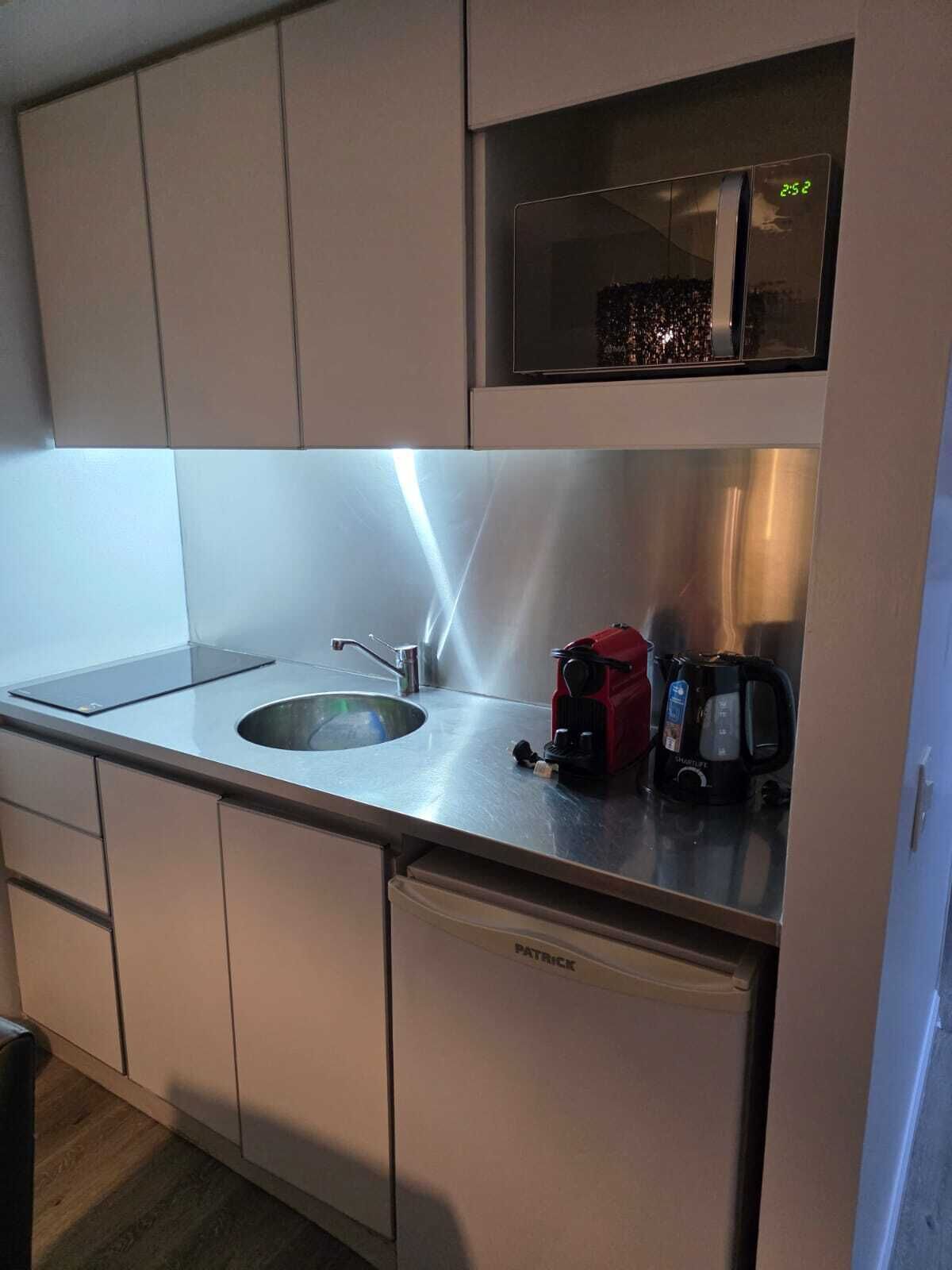 Coffee/tea maker, fridge, microwave, toaster