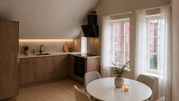 Appartement, 1 chambre, patio | Salle à manger