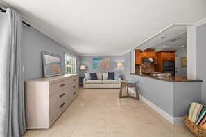 A modern apartment with a living area, kitchenette, and a dining space. - 2600 Managed by Brampton Park (Pompano Beach)