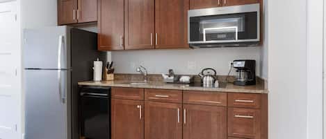 Coffee/tea maker, fridge, microwave, oven