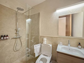 A modern bathroom with a glass-enclosed shower, a toilet, and a sink with a mirror above it. - The Double Room at Riad Timija: En-suite, Breakfast & Rooftop in the Medina (Marrakesh)