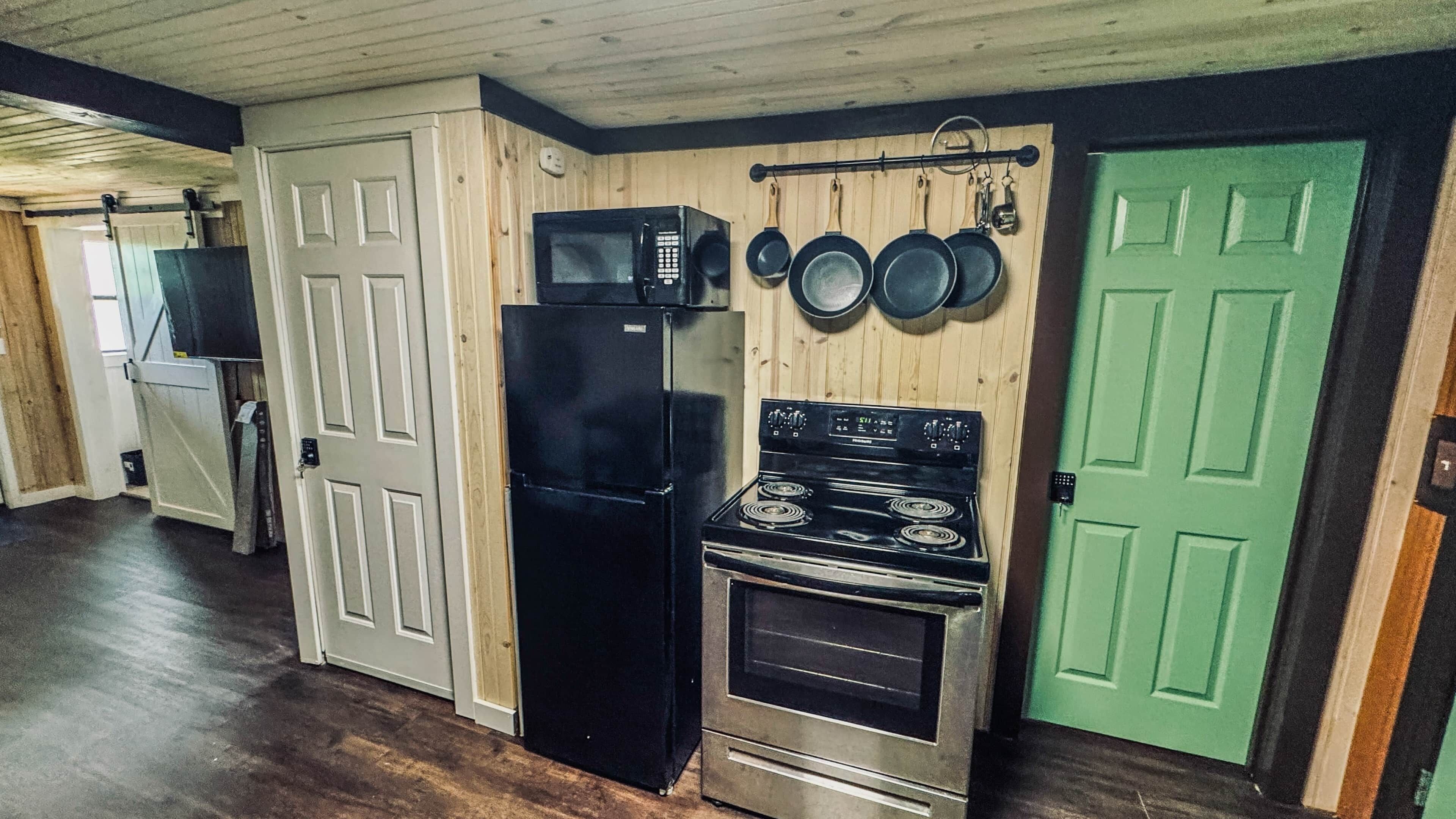 Coffee/tea maker, fridge, microwave, oven
