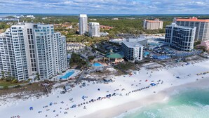 A coastal resort with high-rise buildings, a beach, and a pool area. - 10th-Floor Luau Condo | Fabulous South-Facing Gulf Views & Beach Access (Miramar Beach)