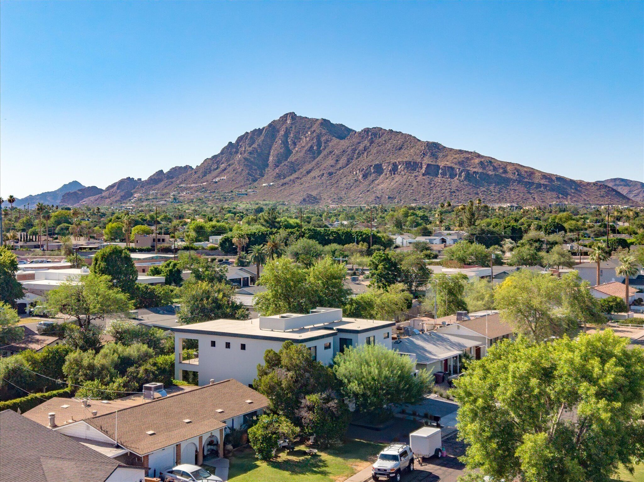 Peaceful residential setting with expansive mountain scenery.