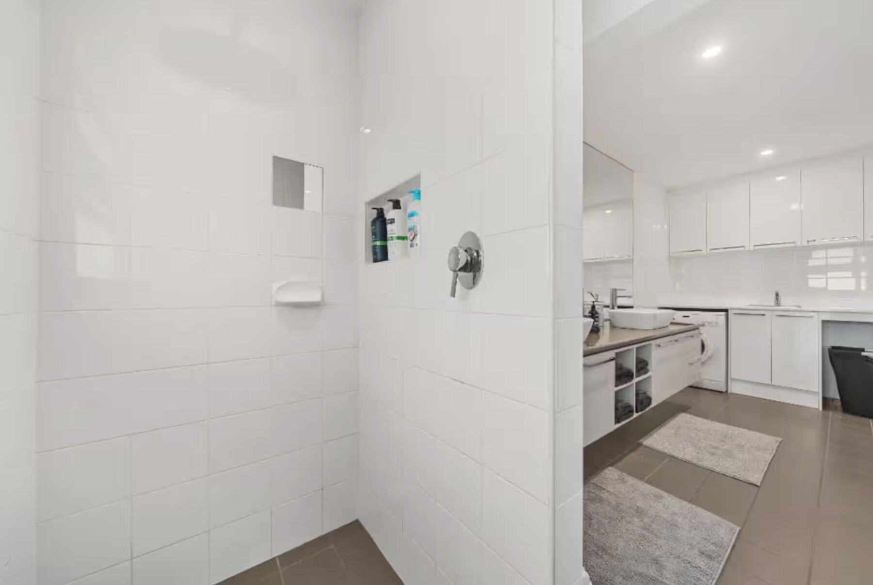 Shower, towels, soap, toilet paper