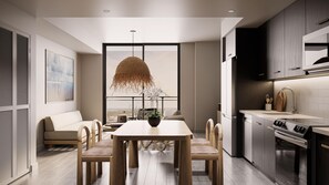 A modern kitchen with a dining area, large windows, and a view of the outdoors. - Sonder at Riverwalk (Fort Lauderdale)