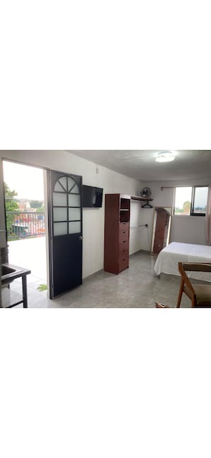Room - Private studio apartment on a terrace with a panoramic view / Arena GDL (Guadalajara)