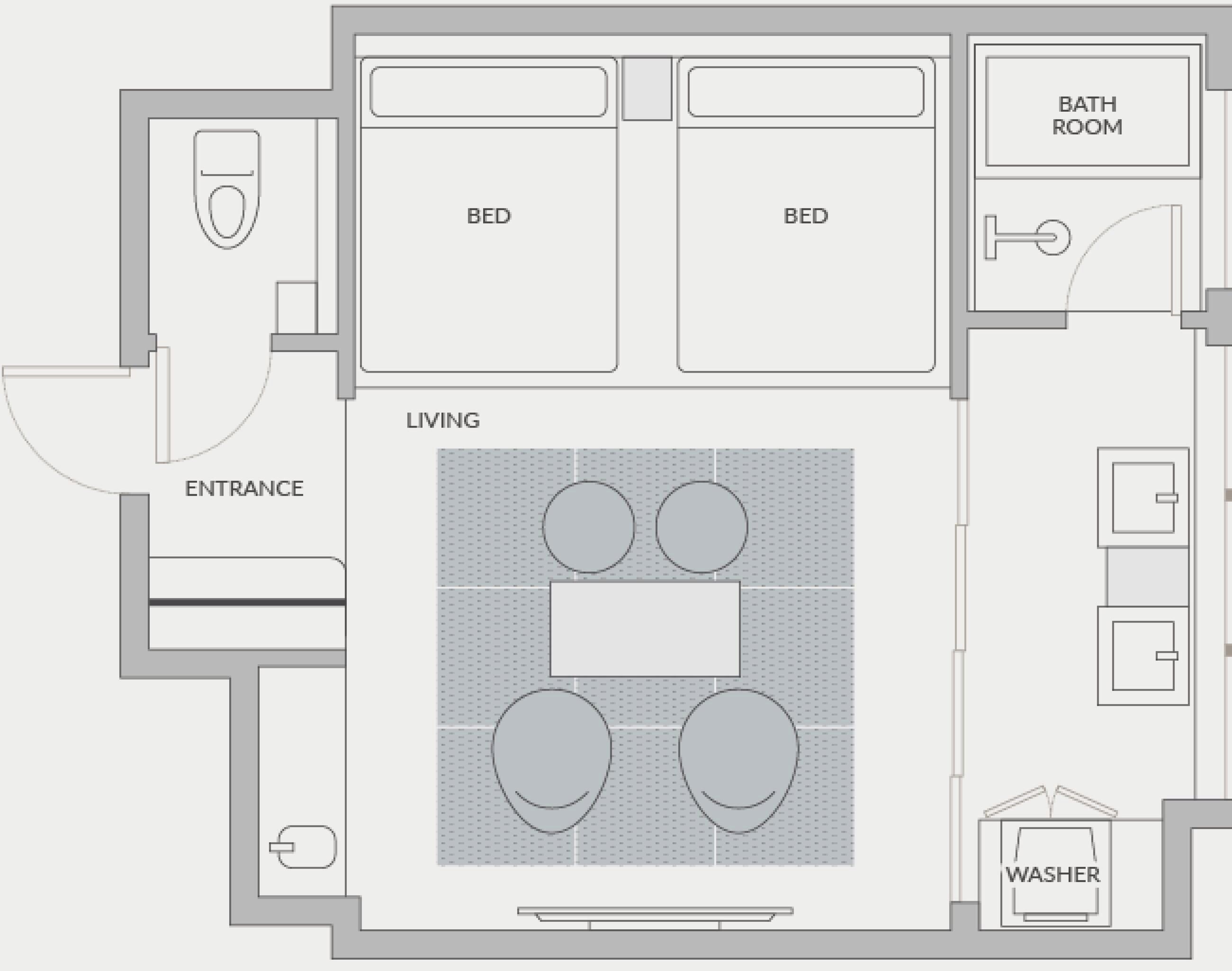 A hotel room layout with two beds, a bathroom, a living area with a kitchen, and an entrance.