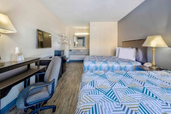 A hotel room with a bed, desk, chair, and a mirror. - 2 Queen Beds | Non-Smoking, Micfridge (Effingham)
