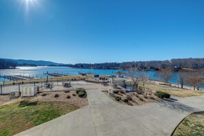 A lakeside park with pathways, seating areas, and a view of the lake. - Waterfront Condo w/ Cove View on Smith Mtn Lake (Huddleston)