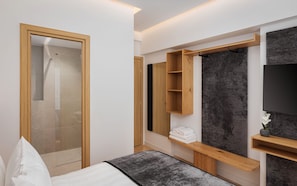 A modern bathroom with a glass shower enclosure, wooden shelving, and a large mirror. - Acropolis Executive Residence  | Chatzichristou Str.16.Athens 11742, Bill & John Apartments & Villas (Athens)
