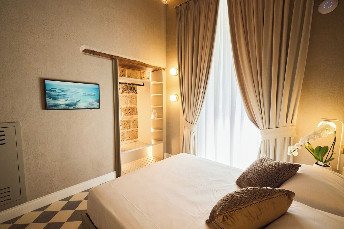 Luxury Quadruple Room - Camera 1 Ginepro | Cofres nos quartos, cortinas blackout, quartos à prova de som