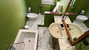 Hair dryer, bidet, towels, soap