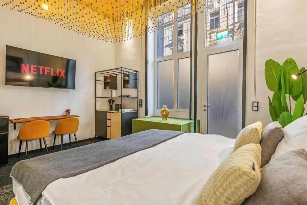 Apartment, 1 King Bed, City View | Iron/ironing board (on request), free WiFi