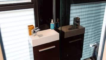 Hair dryer, towels, soap, shampoo