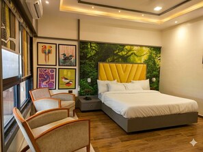 Quarto superluxo | Ferros/tábuas de passar roupa, roupa de cama