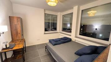 Quarto casal básico, vista para a cidade