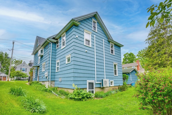 A two-story house with a gabled roof and a front porch. - Walk to Dtwn Clayton & River! 2-unit Getaway (Clayton)