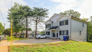 A two-story house with a front porch, a parked SUV, and a mailbox. - Hickory Townhome w/ Deck: 2 Mi to Downtown (Hickory)