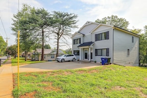 A two-story house with a front porch, a parked SUV, and a mailbox. - Hickory Townhome w/ Deck: 2 Mi to Downtown (Hickory)