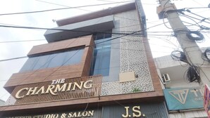 A building with signage for 'The Charming Makeup Studio & Salon' and 'J.S. Tower' with a sign indicating 'Space available for 1st floor area 2000 sqft.' - Classic Hotel Elegant Palace (New Delhi)