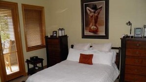 A bedroom with a bed, a dresser, a nightstand, and a framed picture on the wall. - Strawberry Park Condos With Easy Ski-in Ski-out Access Steps Away From Center Of Beaver Creek Village 1 Bedroom Condo (Avon)