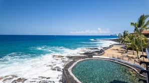 A coastal hotel with a pool, beach, and ocean view. - Big Island Casa De Emdeko B326 1 Bedroom Apts (Kailua-Kona)