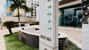 A modern building with a sign that reads 'WANGI GRA 4th'. - Ahead Ponta Negra by Almare (Natal)