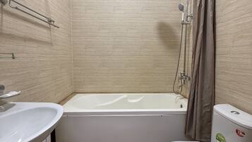 Shower, free toiletries, hair dryer, towels