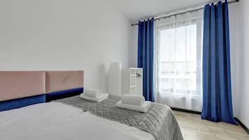 Deluxe Apartment, Balcony, Courtyard View | Iron/ironing board, cribs (surcharge), WiFi (free), bed sheets