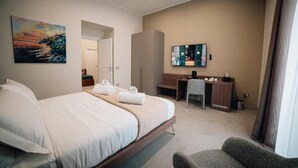 Deluxe Quadruple Room, Balcony, City View | In-room safe, soundproofing, WiFi (free) - BnB Napoli Mobility (Naples)