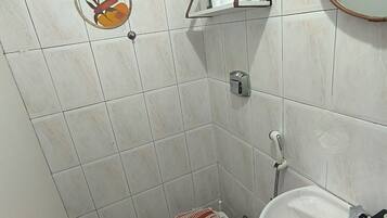 Shower, towels, soap, toilet paper