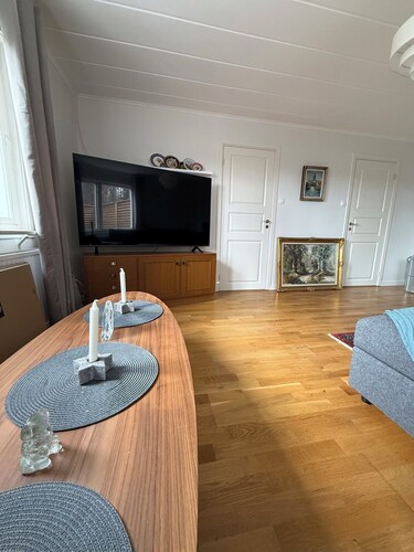 Cozy villa near Hallstavik and Grisslehamn with a large patio and hot tub